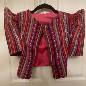 Philippine xs bolero with butterfly sleeves.